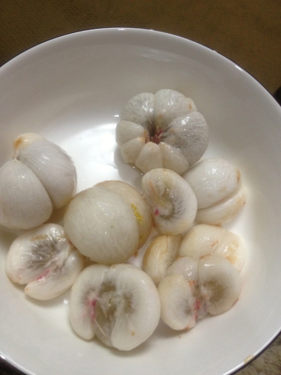 The black spots that you see are actually the seeds of the mangosteen